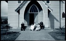 Father Otto (Wulfram) Duchting, SS.CC. (left) and Father Ulrich Taube, SS.CC. (right), with church members, Saint Elizabeth Church, Aiea, Oahu, 1929.